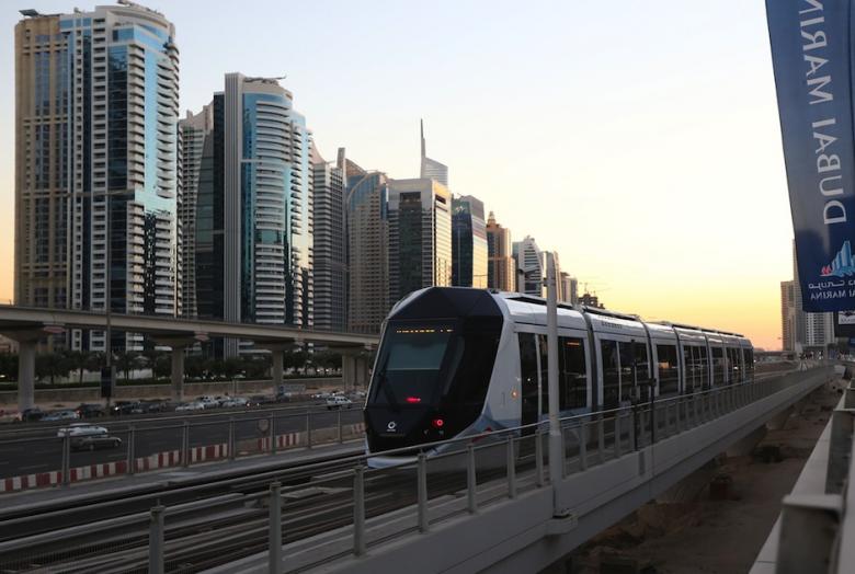 Dubai's new tram moves out of a station at the Marina in Dubai on November 12, 2014. AFP/Marwan Naamani