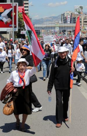 Lebanese Armenians march with flags and signs on the …